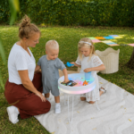 Lumi'sense Interactive Light-Up Sensory Table playing with kids outdoor