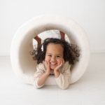 adventure tunnel foam bouclé cream with kid smiling