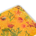 liquid filled sensory pad details of glitter and animals